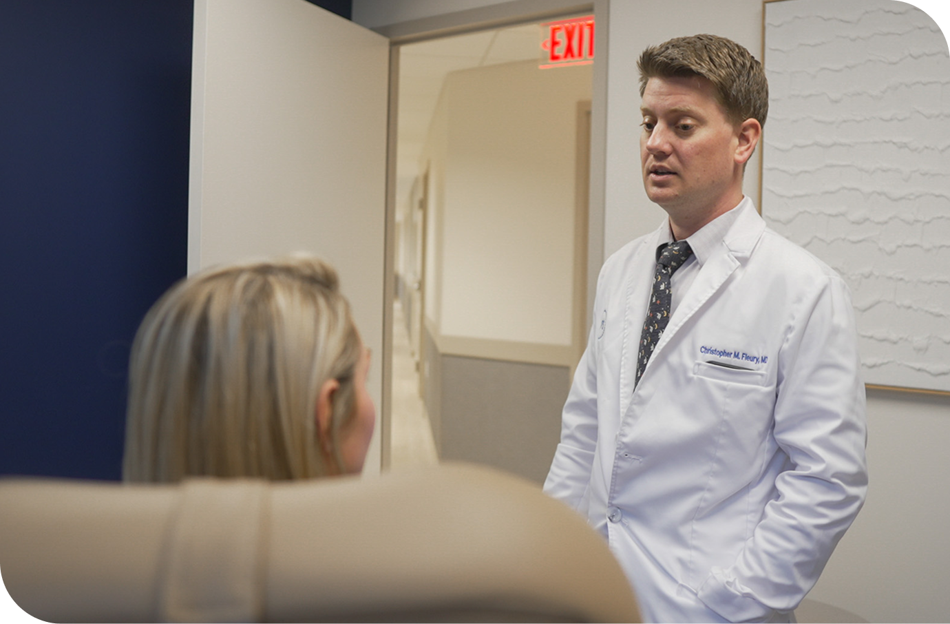 Center for Plastic Surgery surgeon consulting with a patient