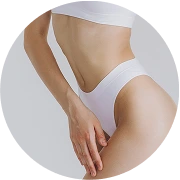 Person touching their torso, demonstrating body contouring or skin tightening concern area