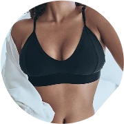 Woman's torso and chest area showing body contouring and definition