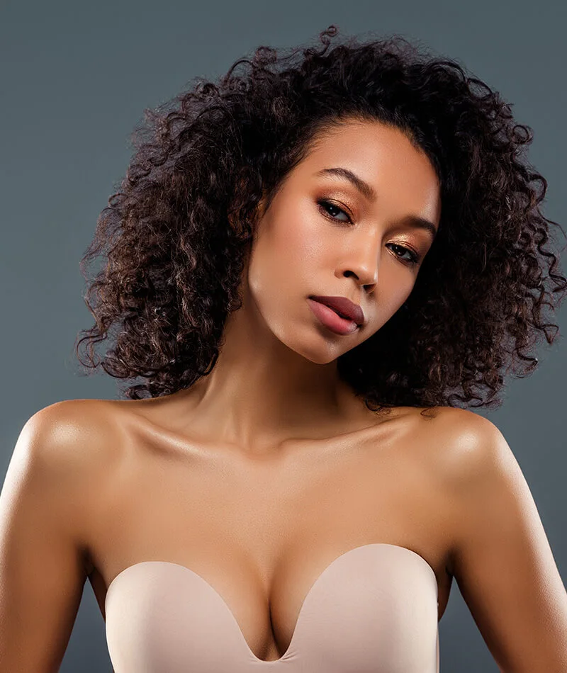 Woman in a tan strapless bra