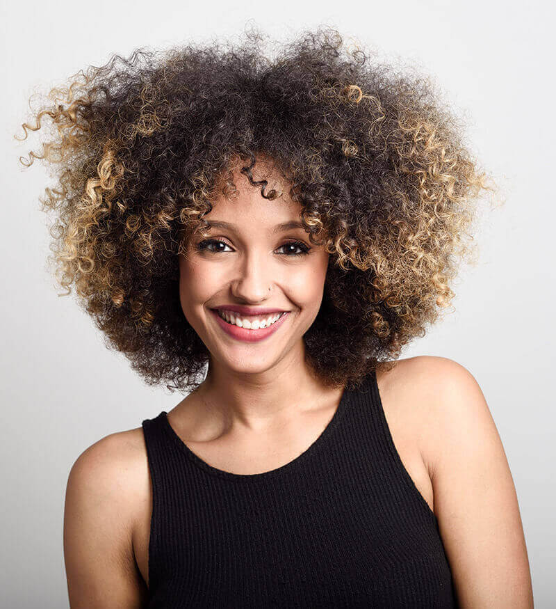 Young woman with curly hair