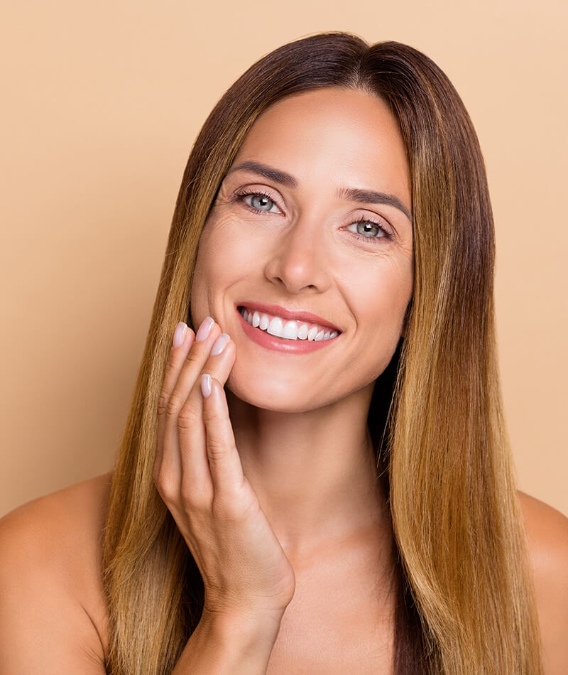 Mature woman touching her chin