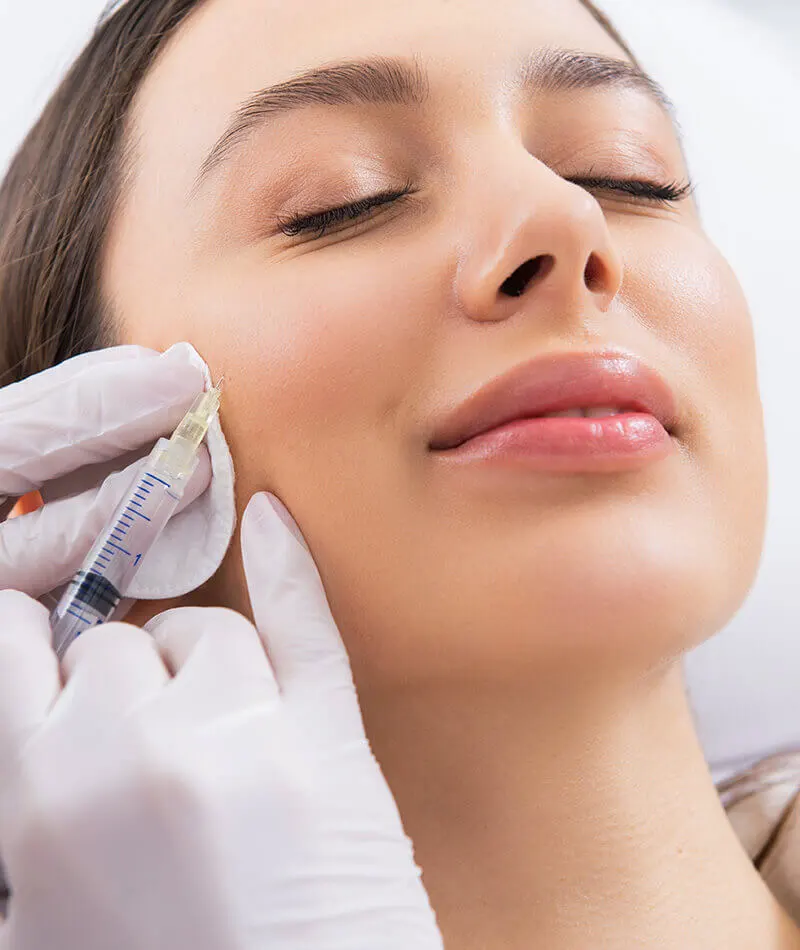 Young woman getting an injection