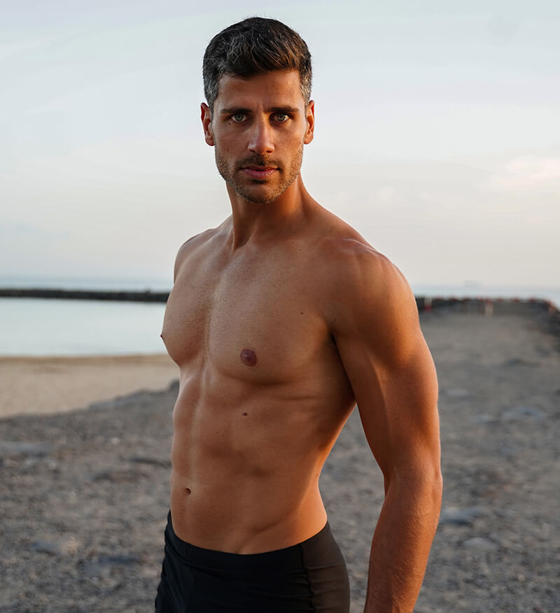 Fit man at the beach