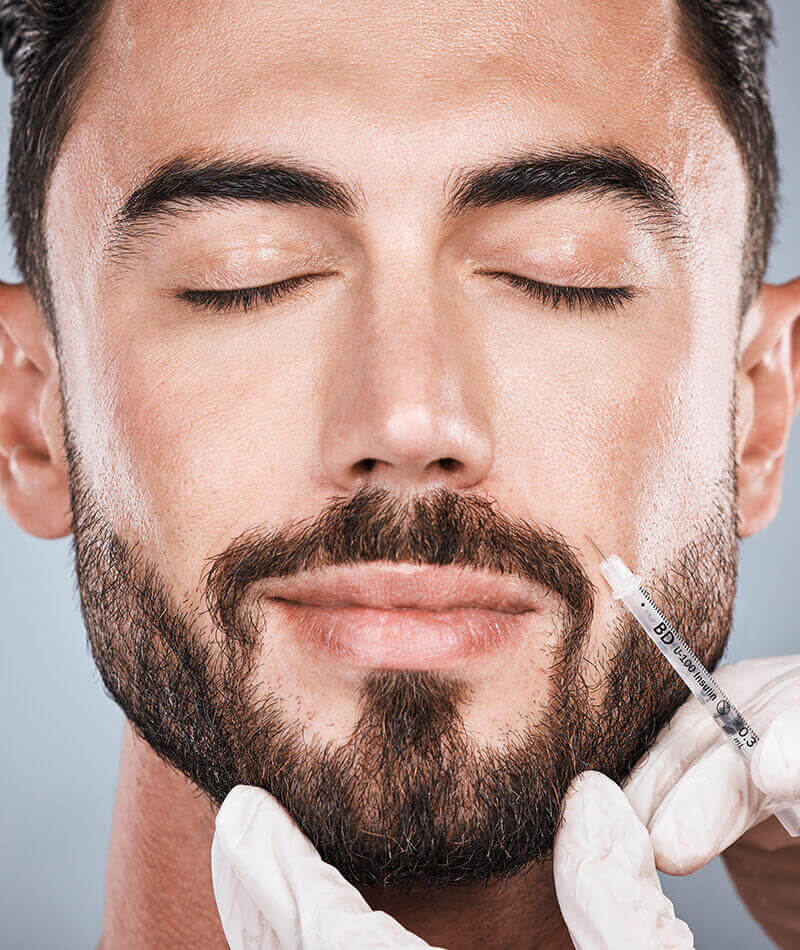 Man getting a filler in his cheek