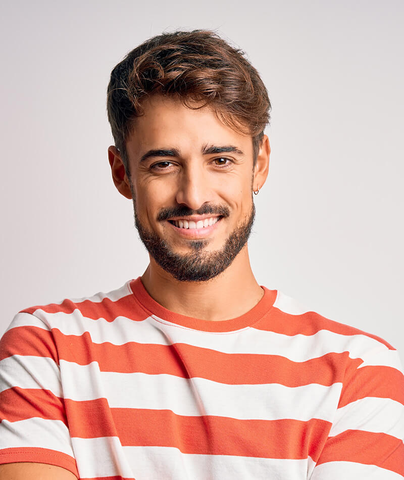 young man in a striped shirt